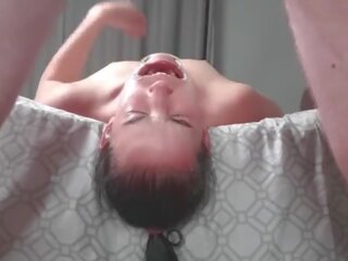 Upside down piss loving harlot laying face down from bed swallows piss in two non identical camera angles